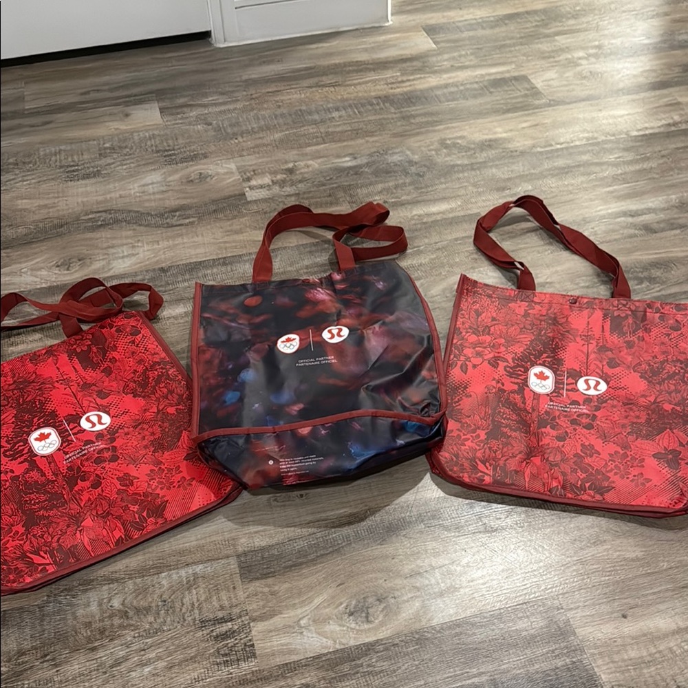 Lululemon Athletica Red and Black Totes Olympic Collection